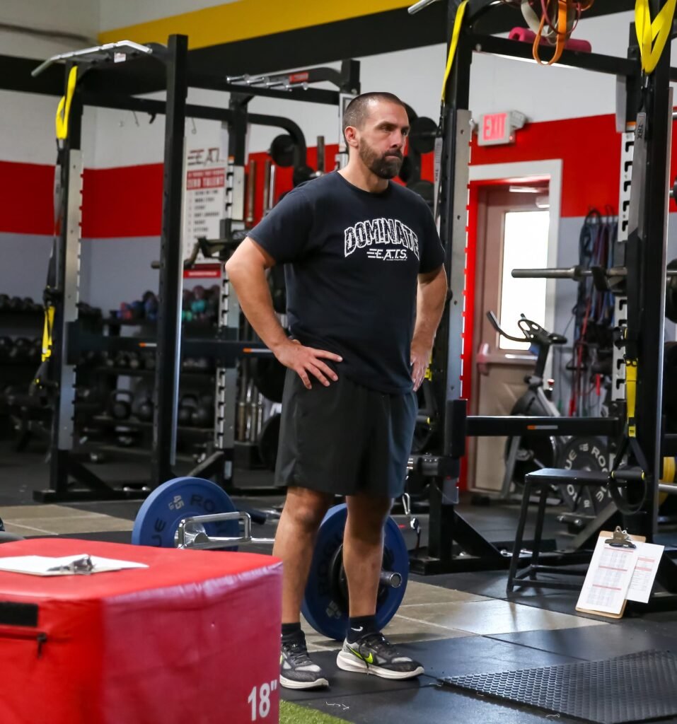 Sports Performance Coach
Tony Russo is a seasoned professional in the performance training industry with more than two decades of experience helping athletes and organizations reach their highest potential. His passion for performance and human development began in high school when his father pursued a degree in Kinesiology at the University of Maryland. That early exposure to the science of movement inspired Tony to pursue his own path in Exercise Science and Athletic Training at Western Maryland College (now McDaniel College).